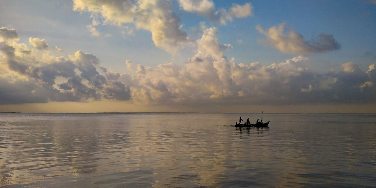 SCENIC VIEW OF SEA DURING SUNSET