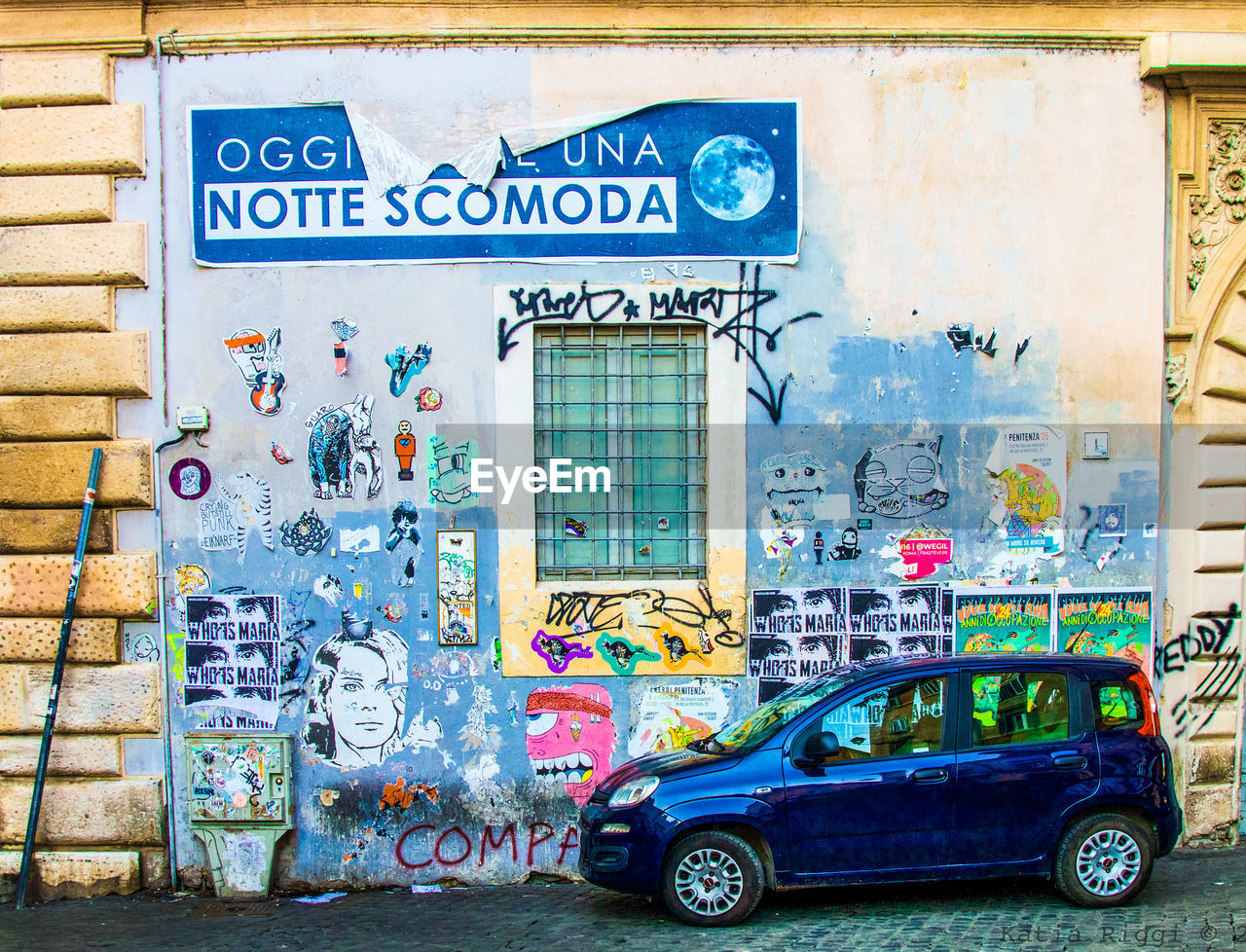 GRAFFITI ON WALL WITH TEXT ON BRICK WALLS