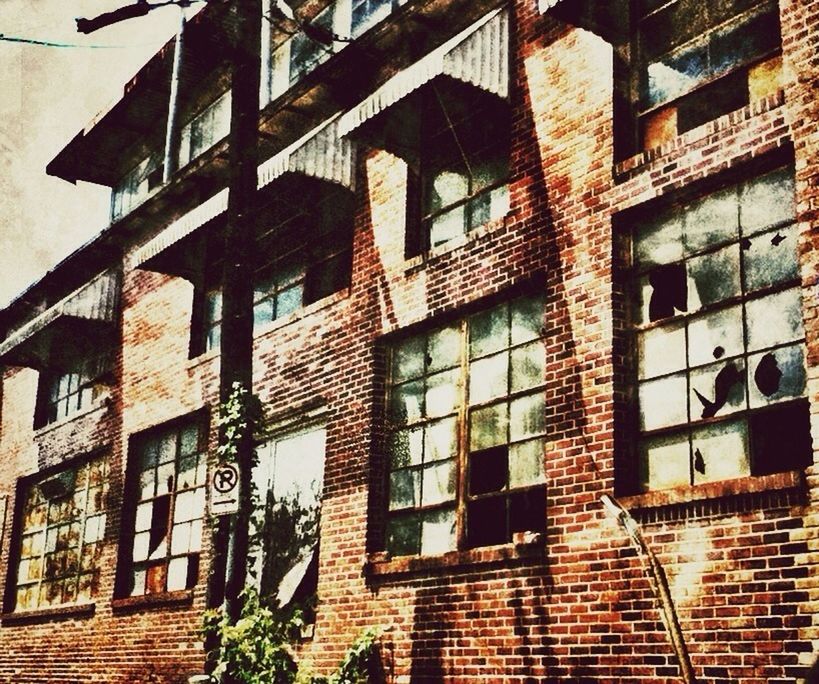 LOW ANGLE VIEW OF RESIDENTIAL BUILDING