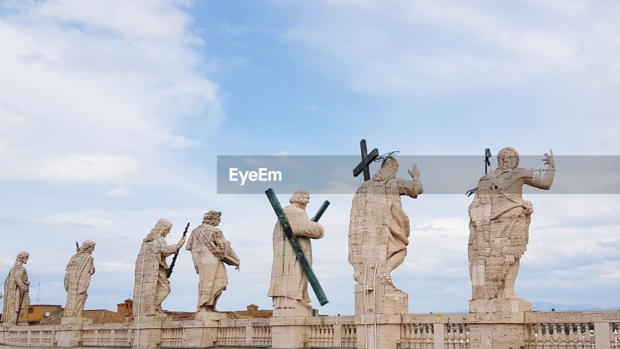 Low angle view of statues against sky vatican 