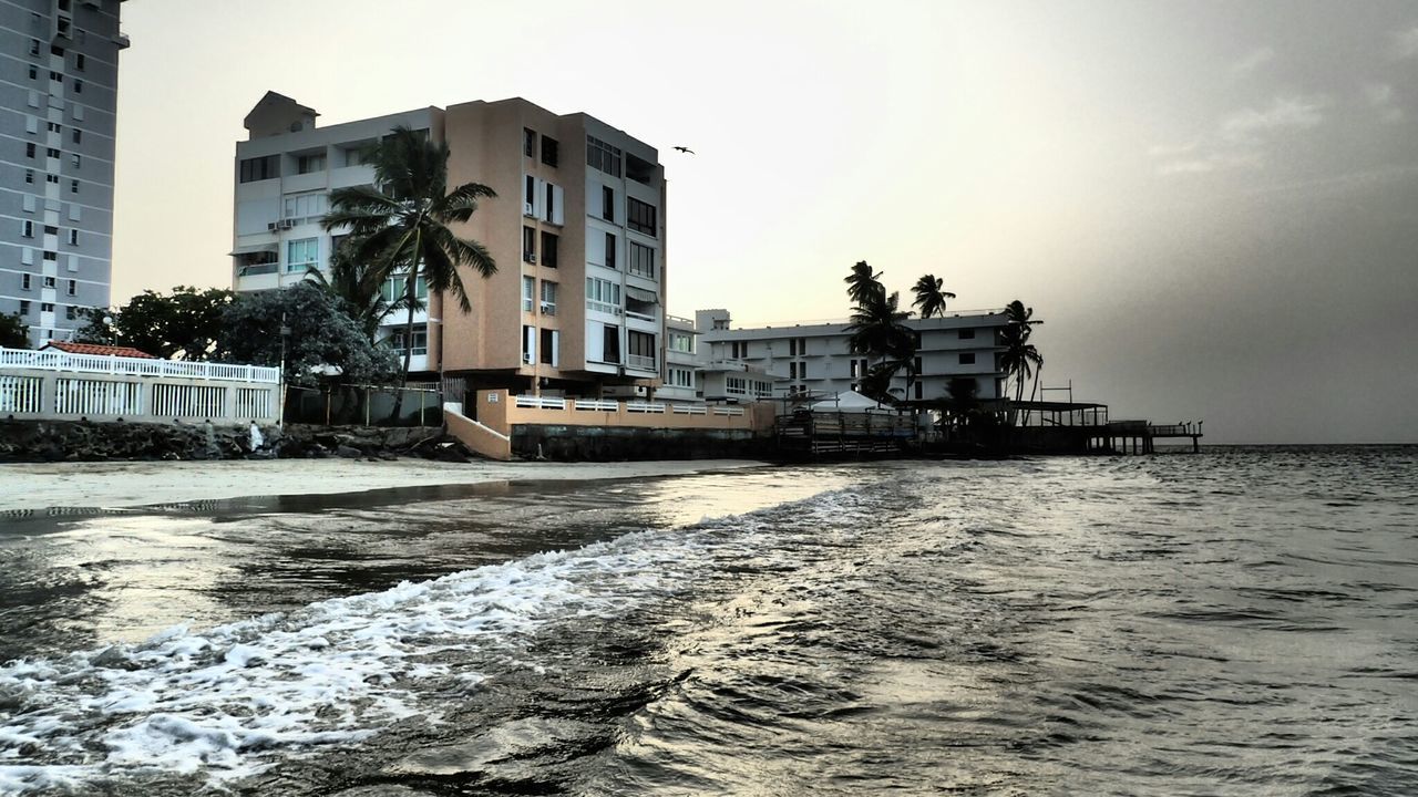 VIEW OF BUILT STRUCTURES WITH WATERFRONT