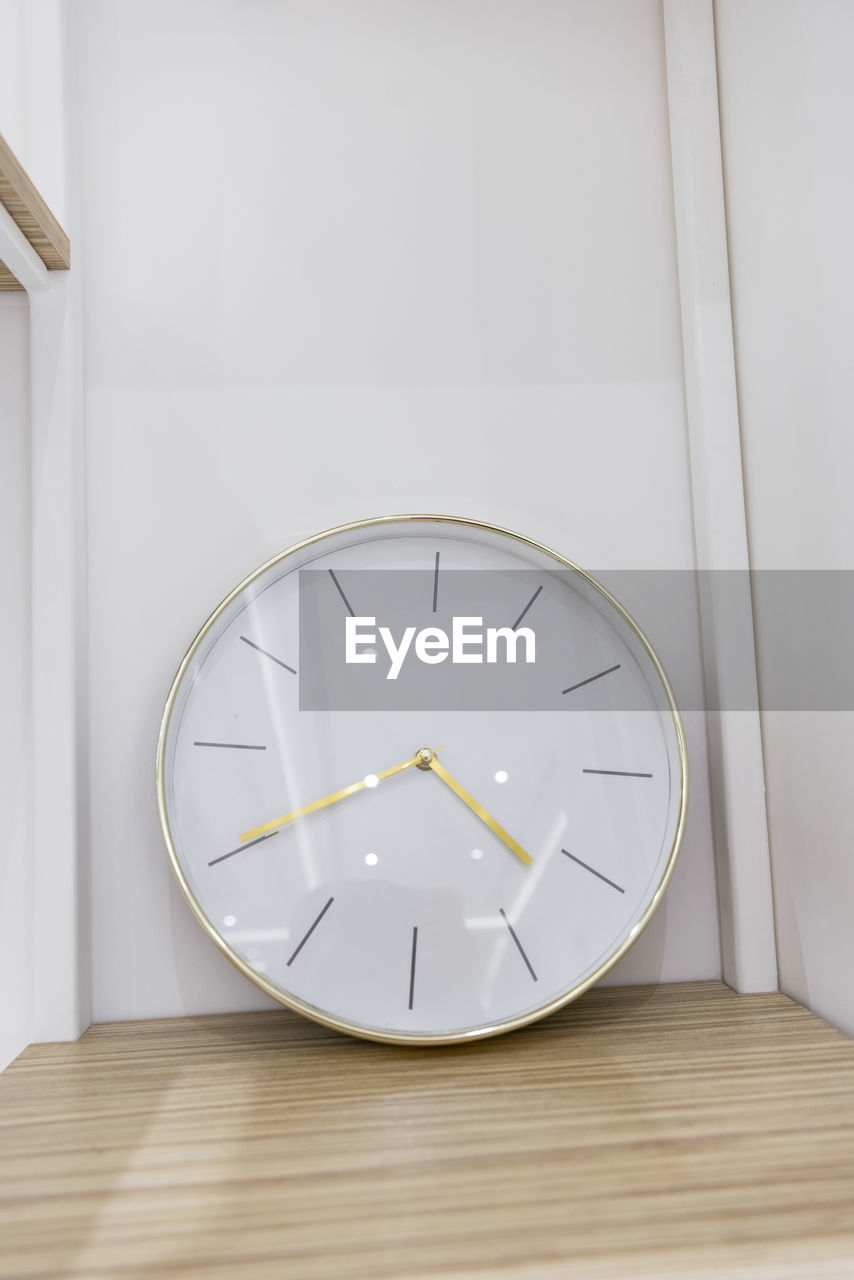 clock, time, furniture, interior design, clock face, indoors, wall clock, wall - building feature, no people, white, instrument of time, minute hand, home interior, circle, geometric shape, simplicity, wood, copy space, shape