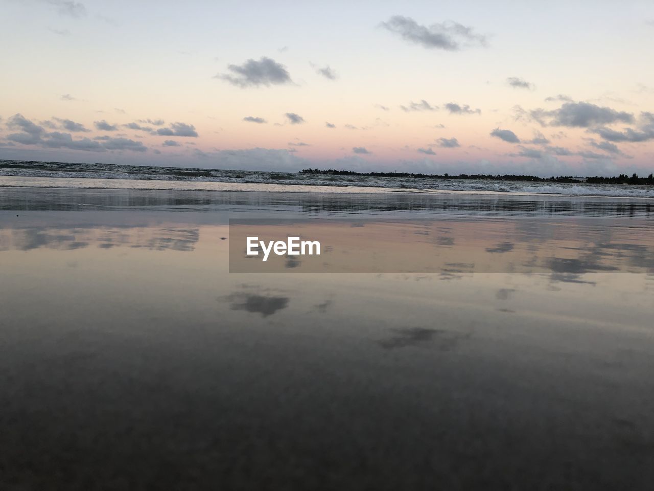 SCENIC VIEW OF SEA DURING SUNSET