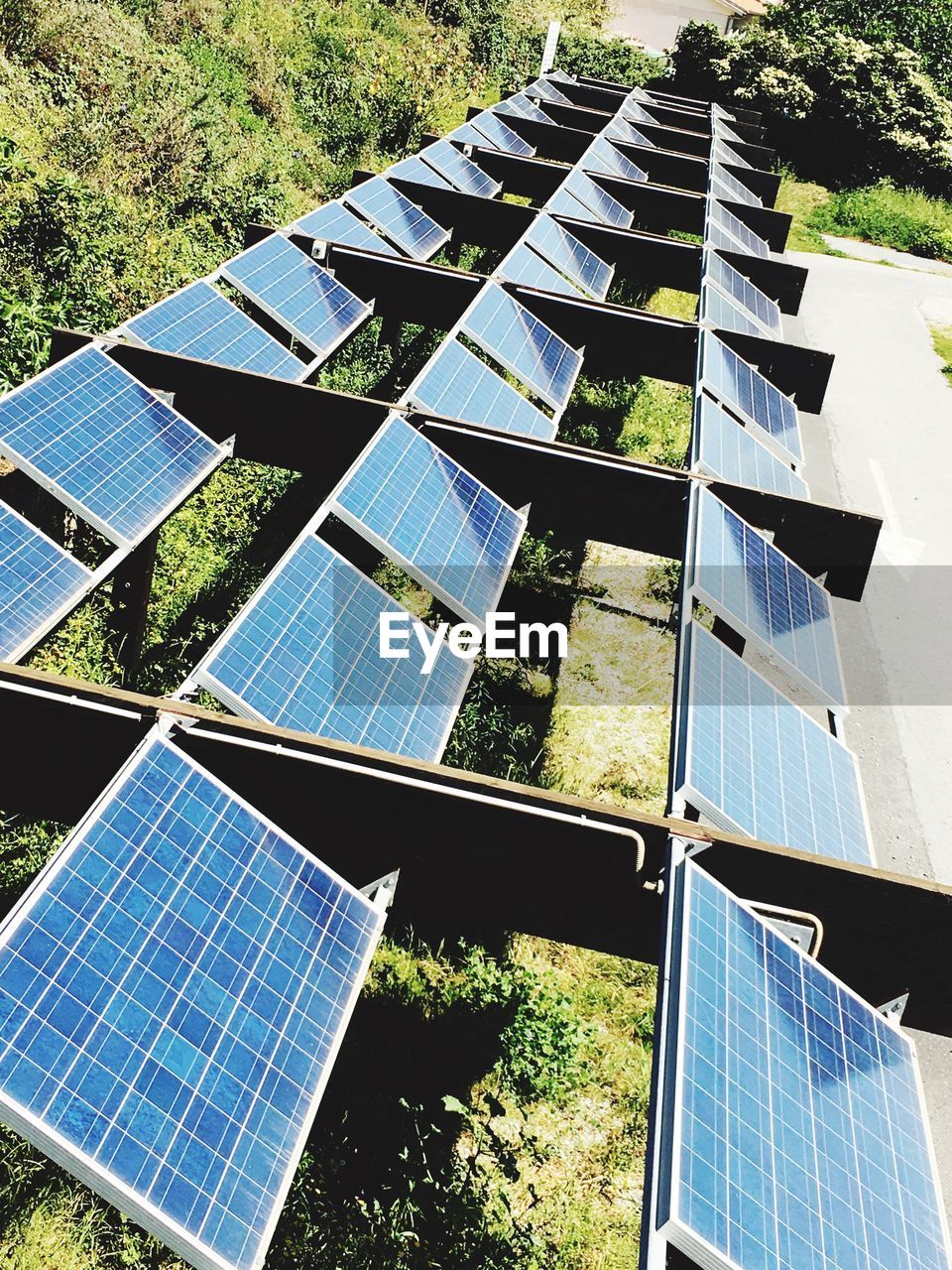 High angle view of solar panels over plants