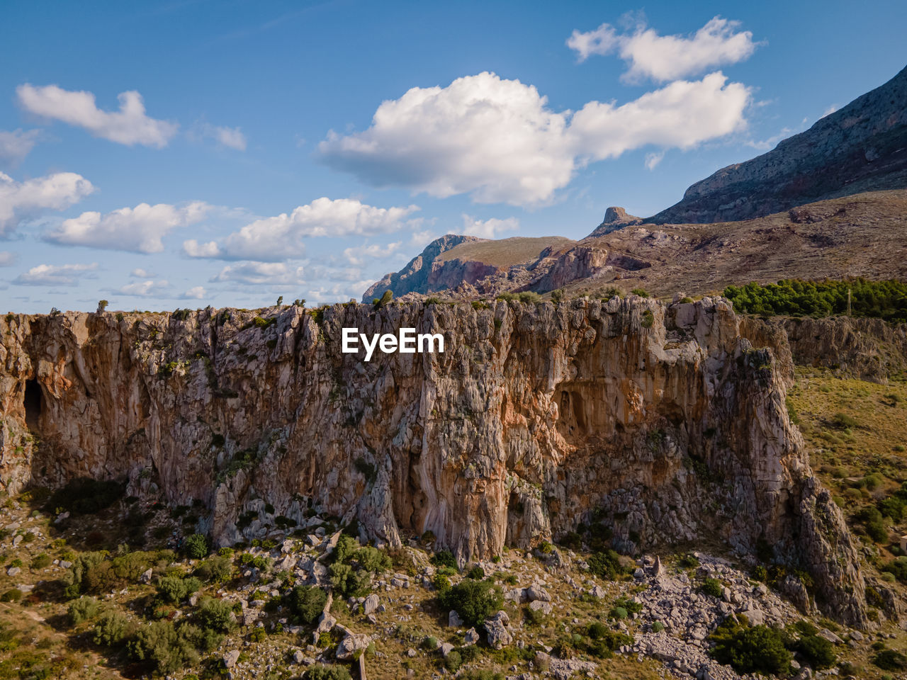 PANORAMIC VIEW OF ROCK FORMATIONS AGAINST SKY