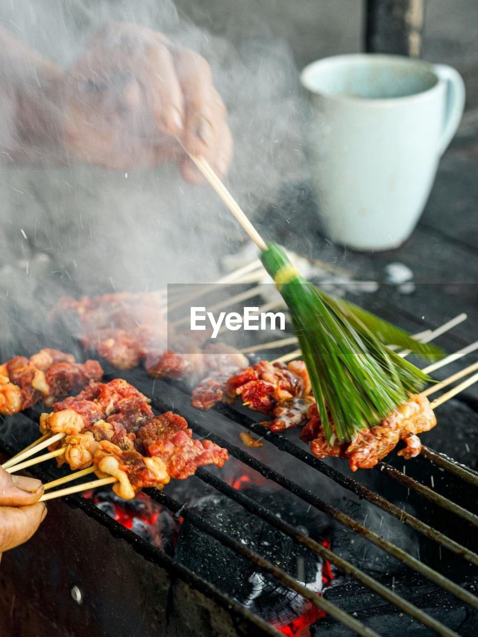 Close-up of meat on barbecue grill