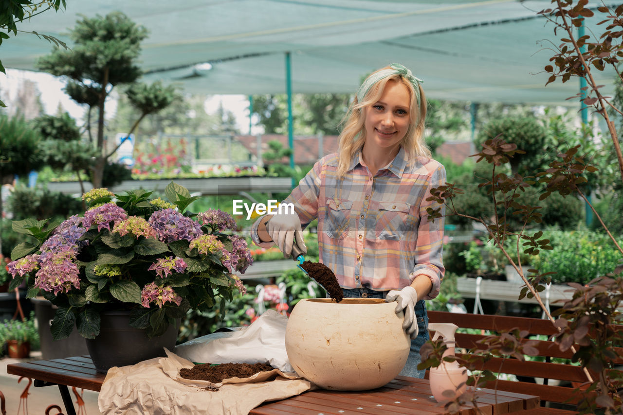 Portrait of gardener working at garden