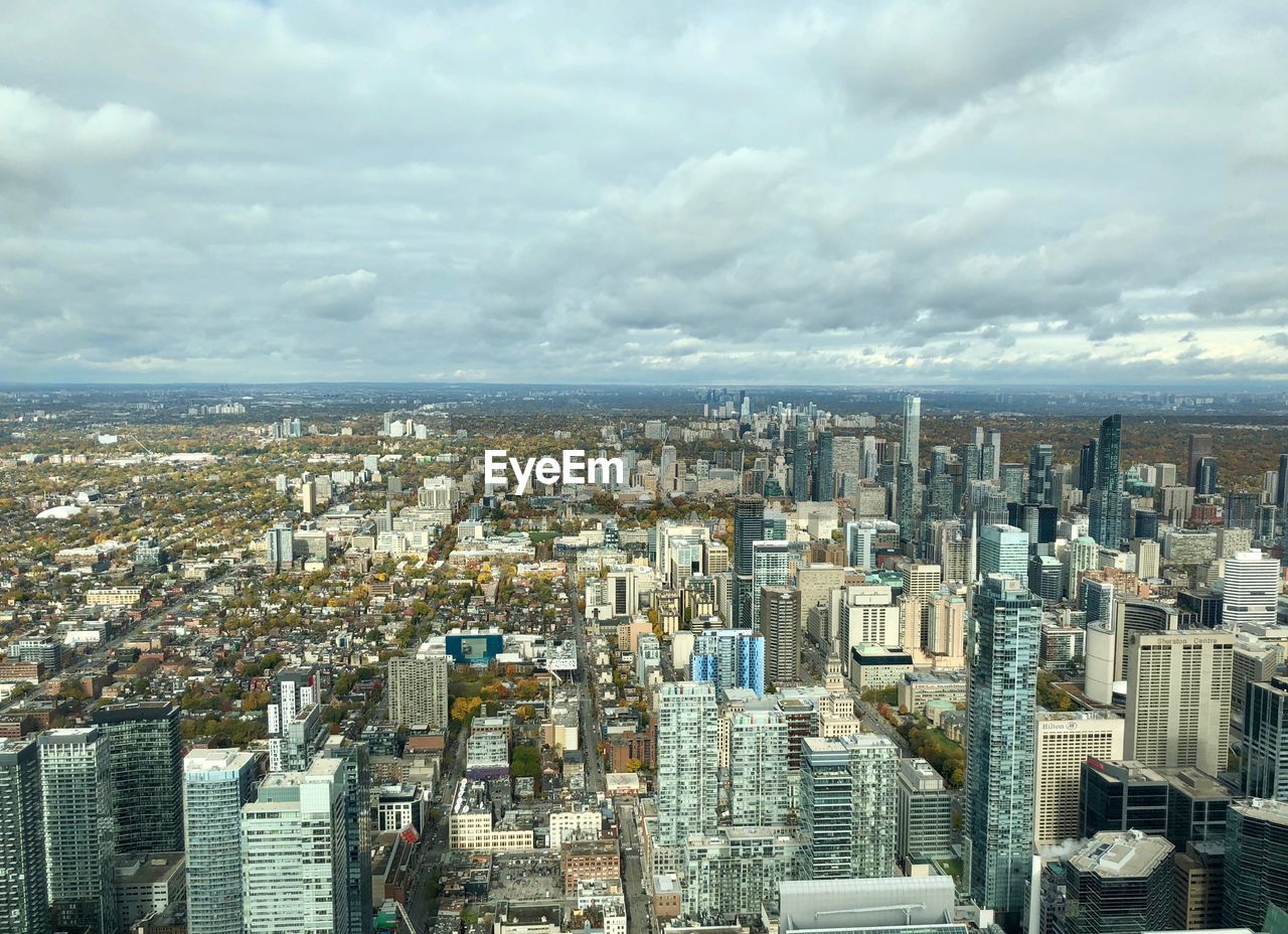 High angle view of buildings against sky in city