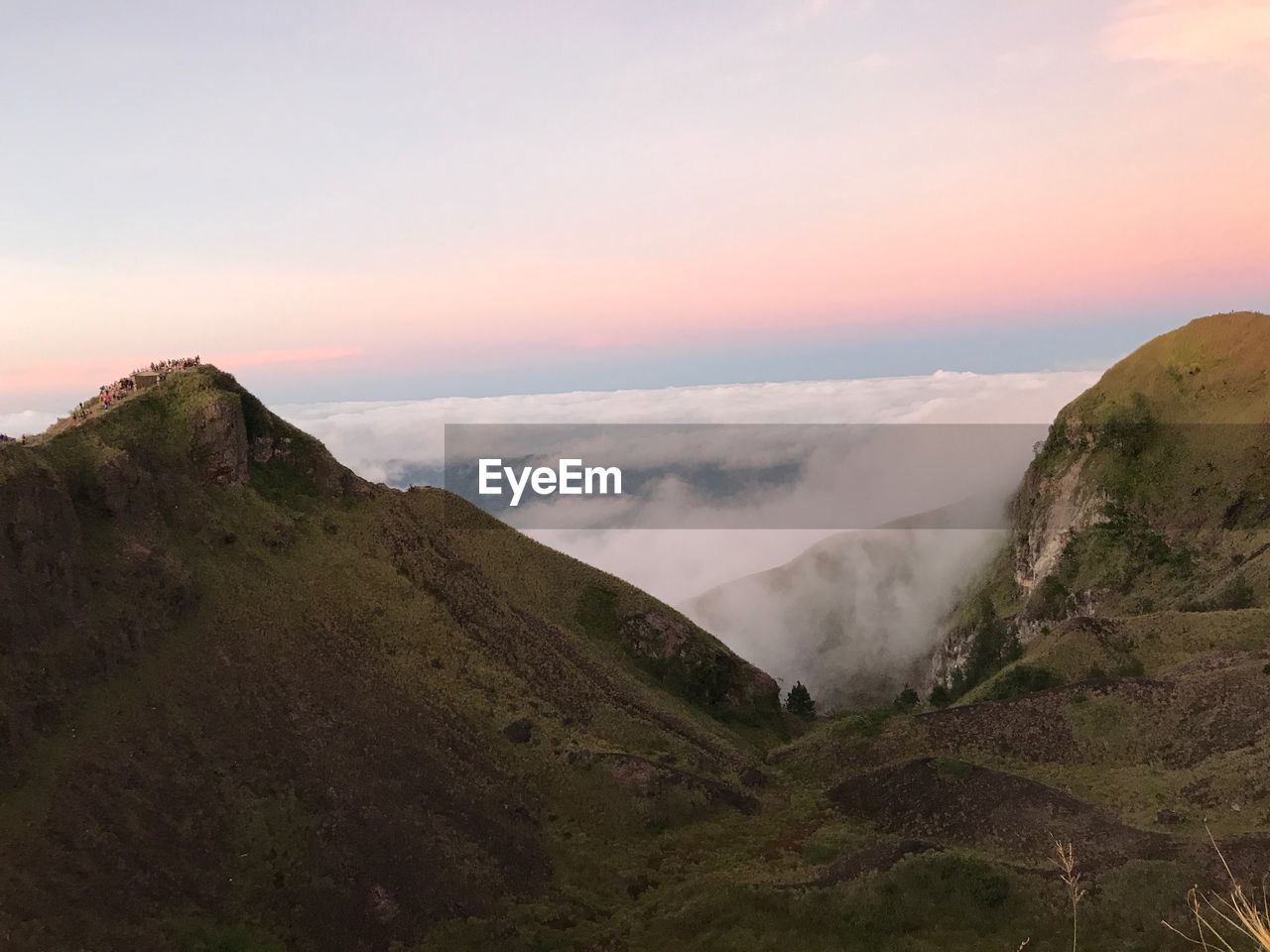 Scenic view of mountains against sky during sunset