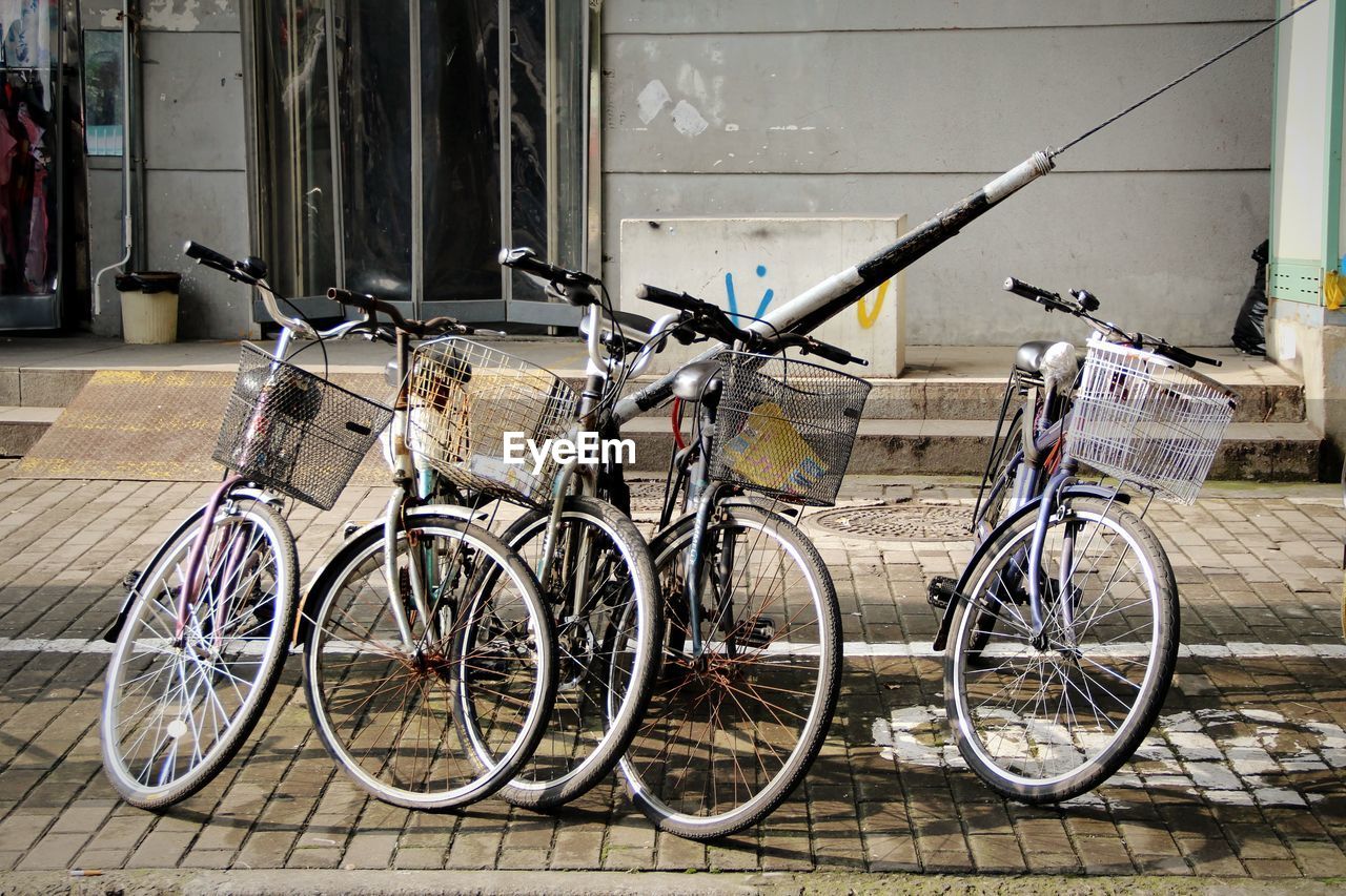 Bicycles parked on footpath