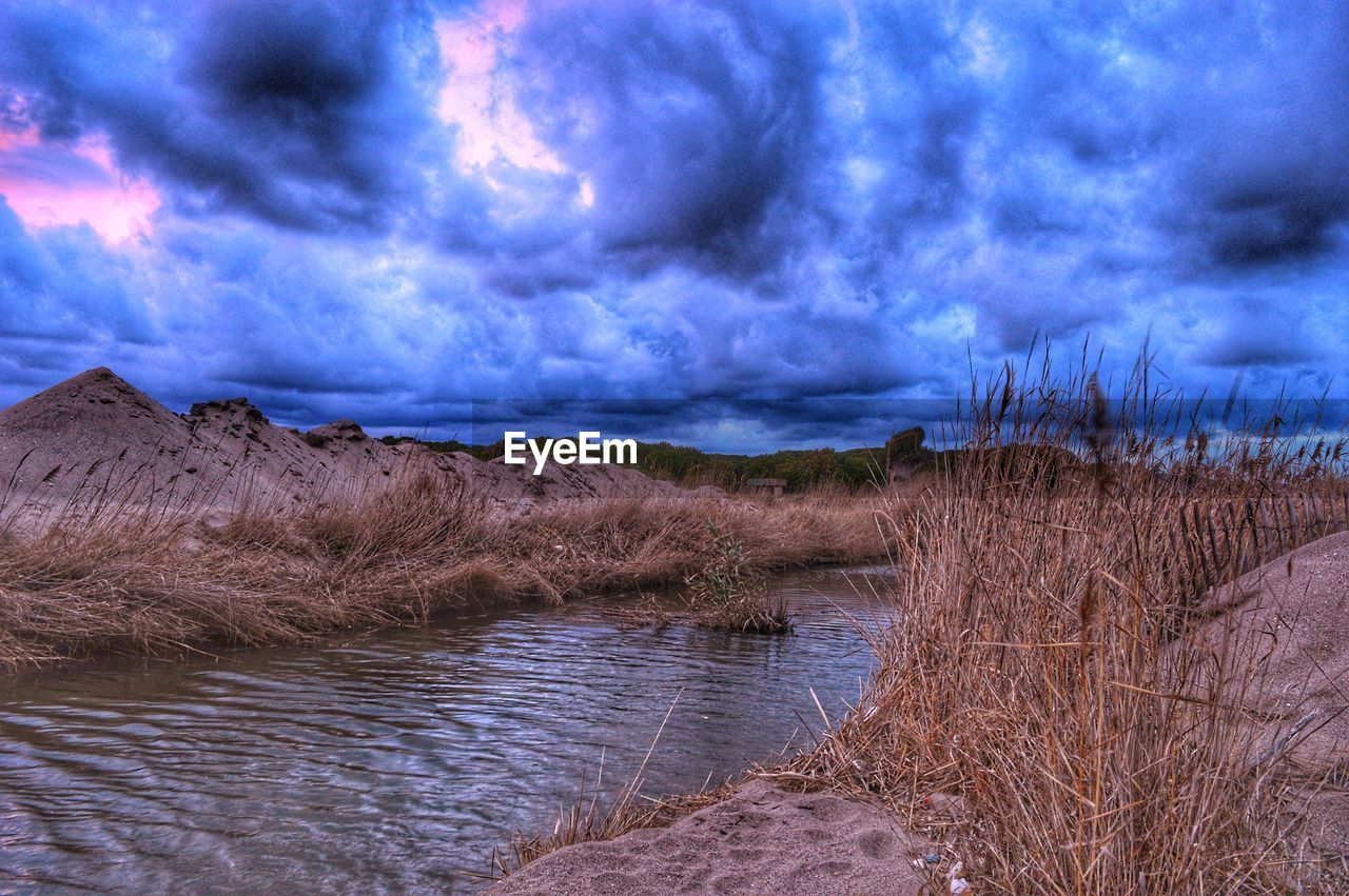 RIVER AGAINST SKY