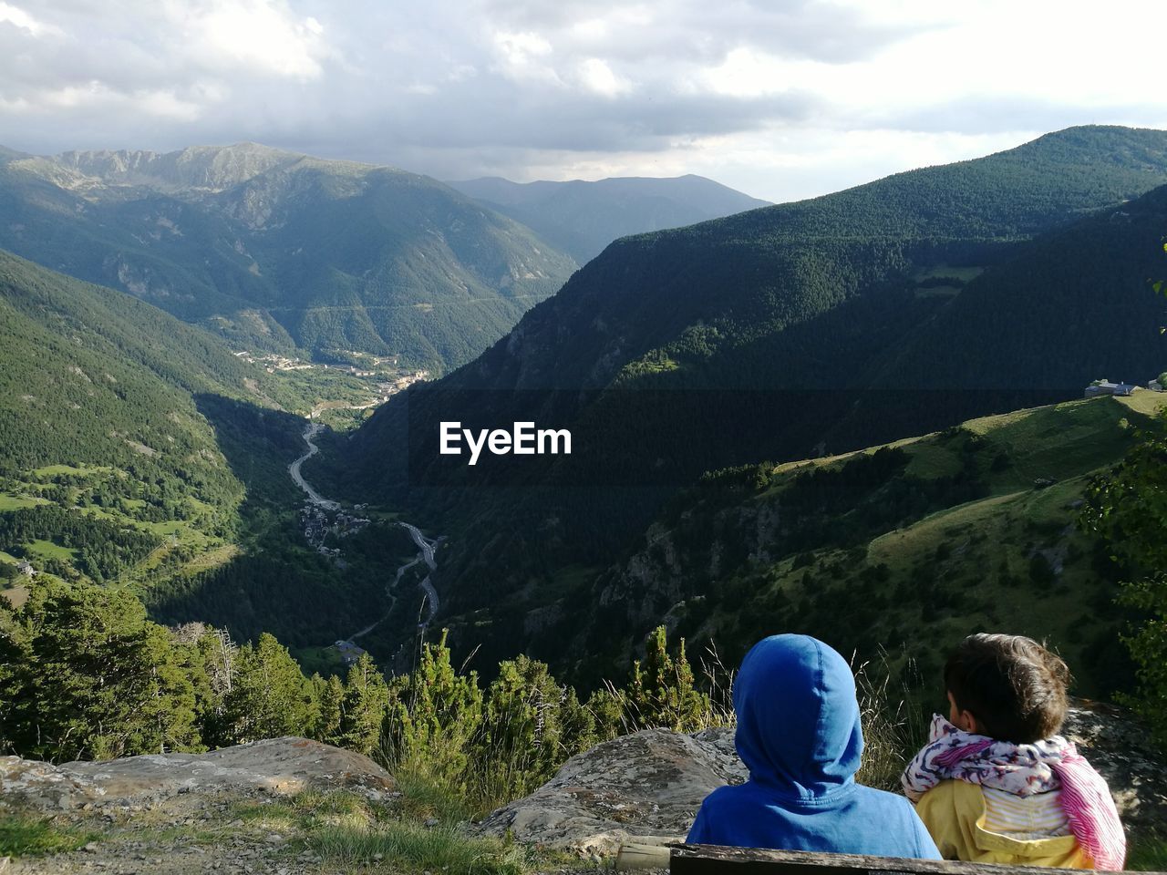 High angle view of friends looking at mountains