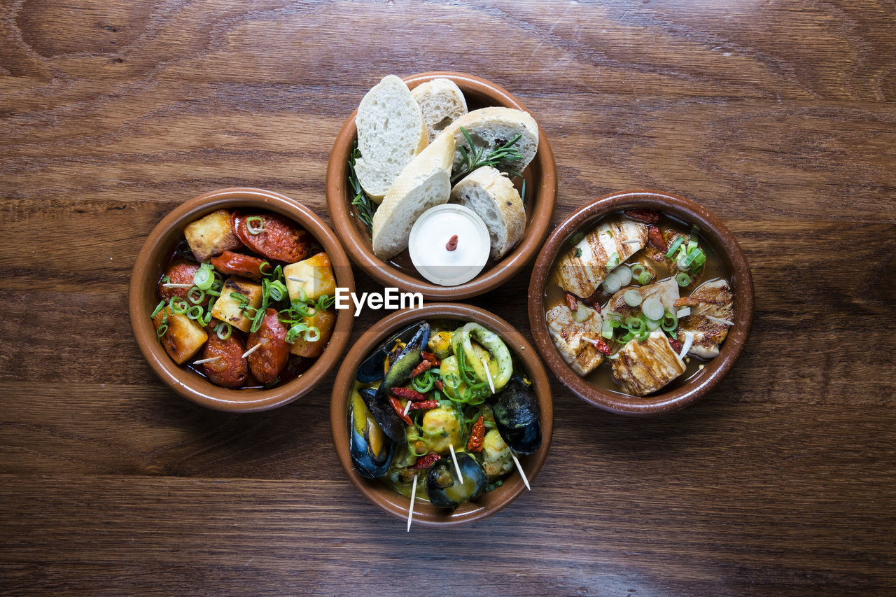 HIGH ANGLE VIEW OF VARIOUS FRUITS IN BOWL ON TABLE