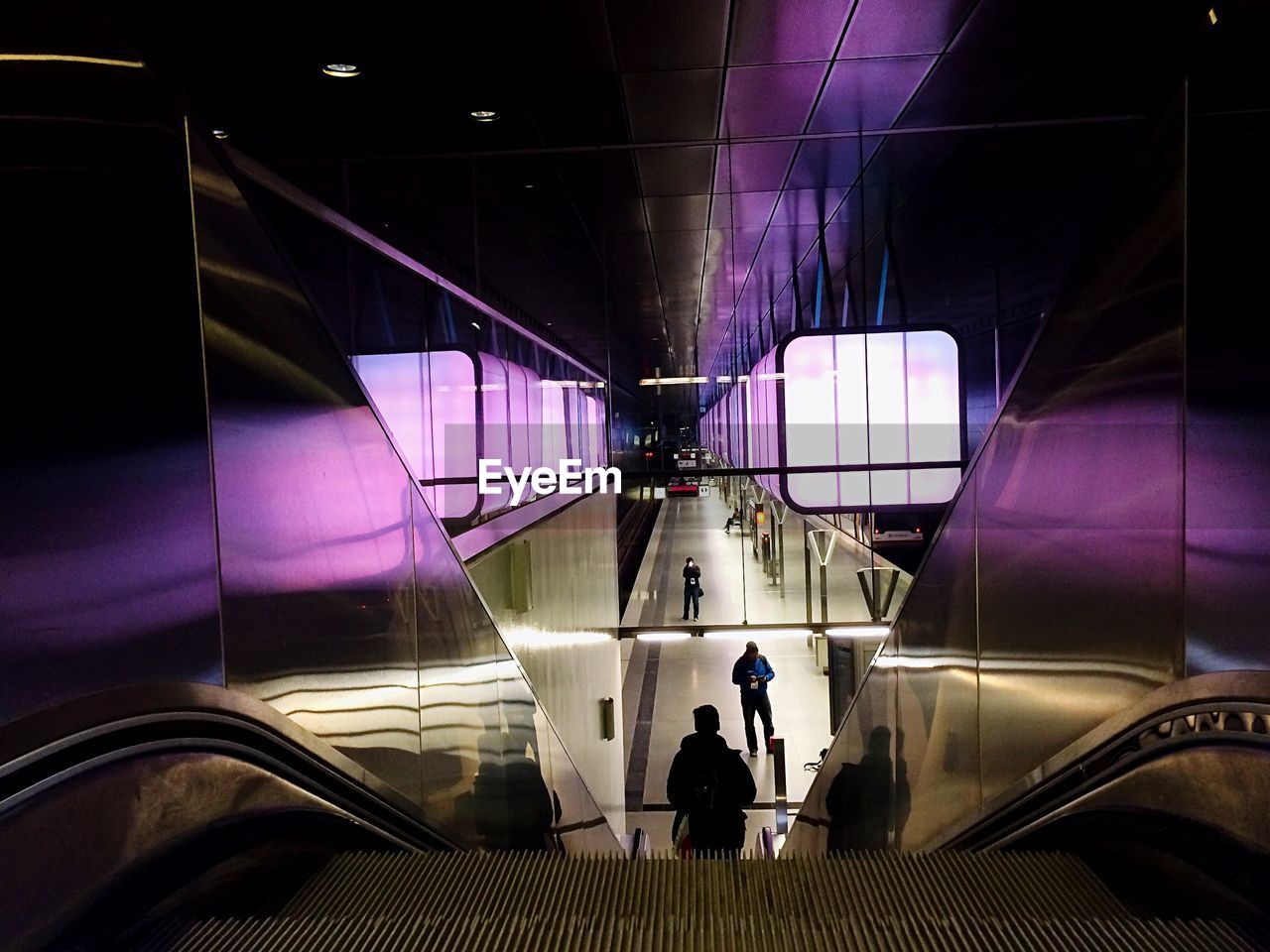 High angle view of people on escalator