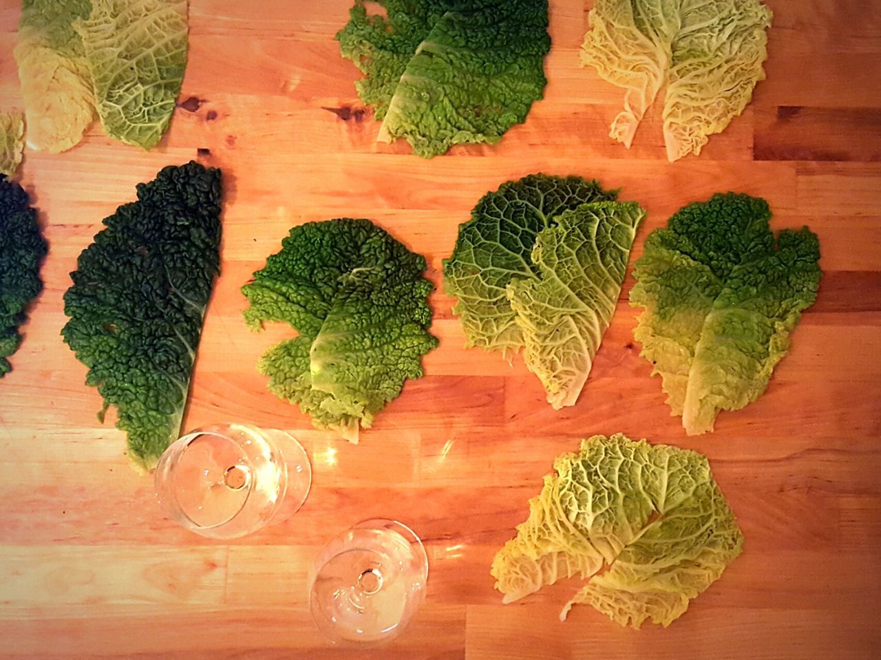 High angle view of cabbage leaves on table