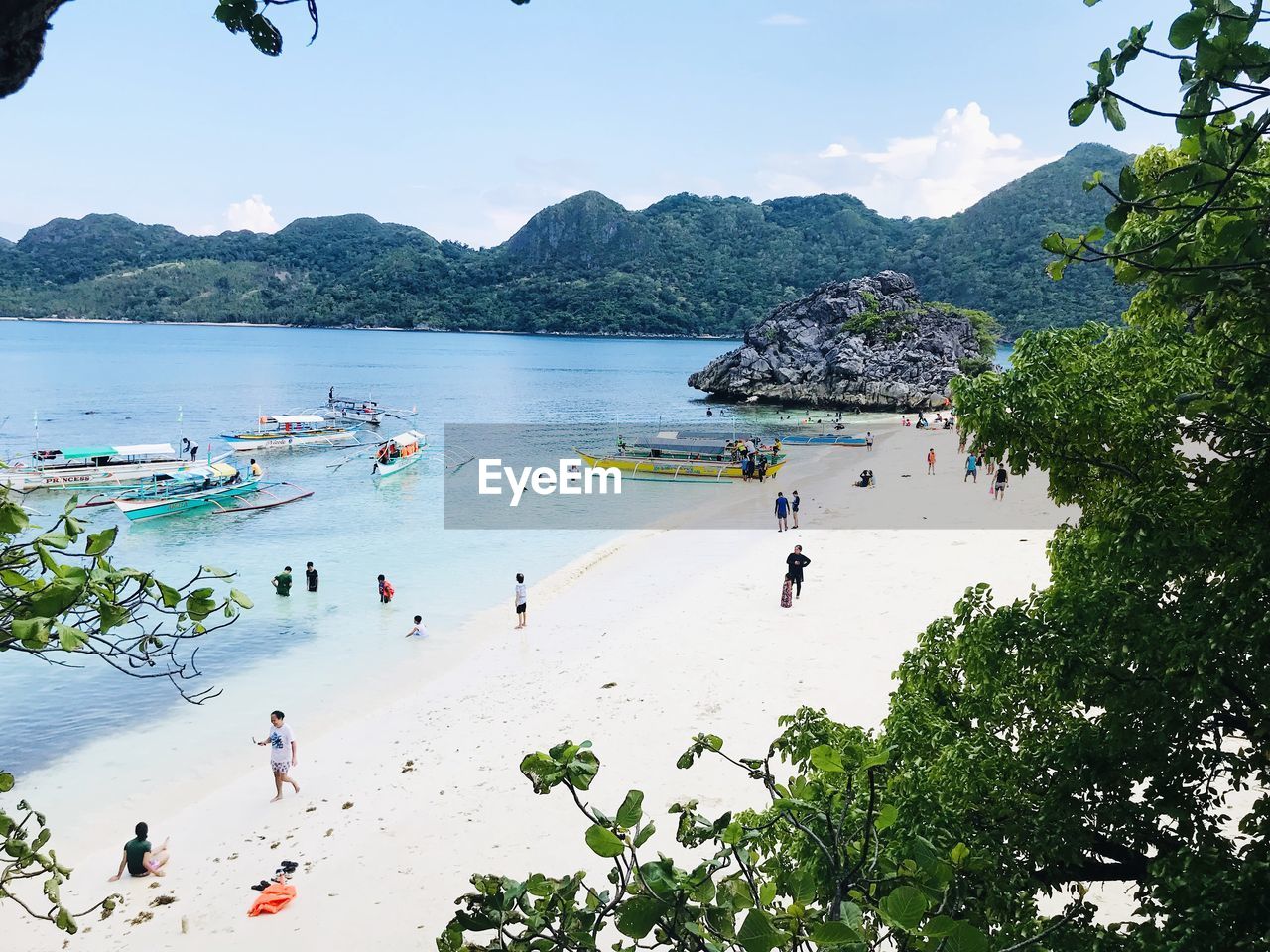 GROUP OF PEOPLE ON BEACH