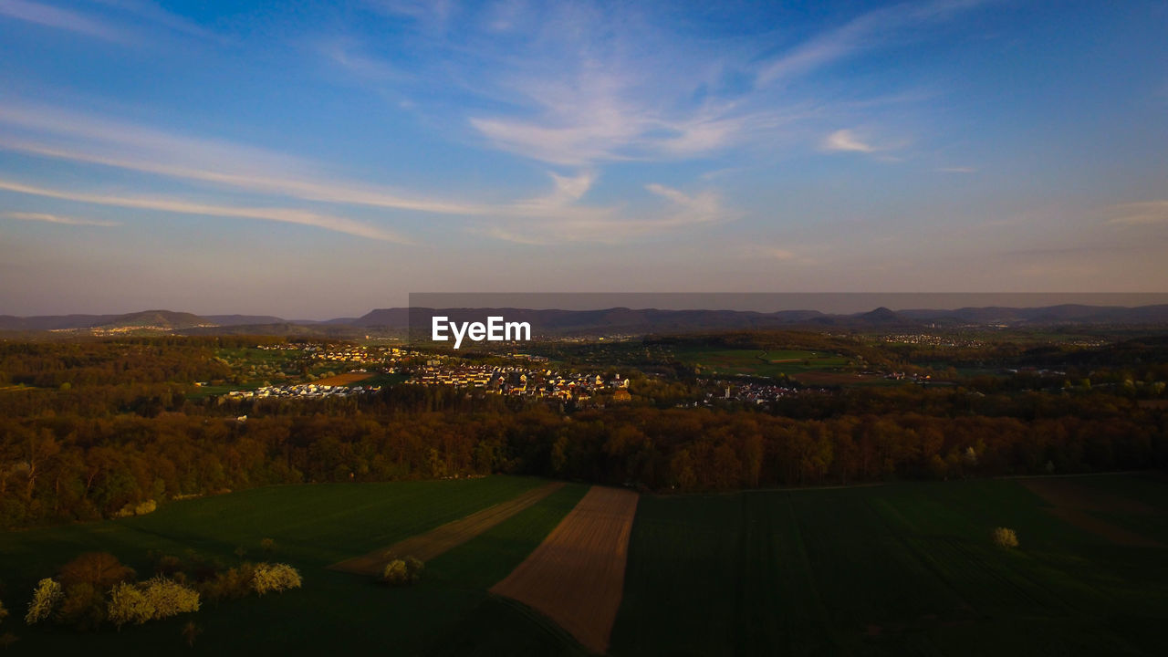 Scenic view of landscape against sky during sunset