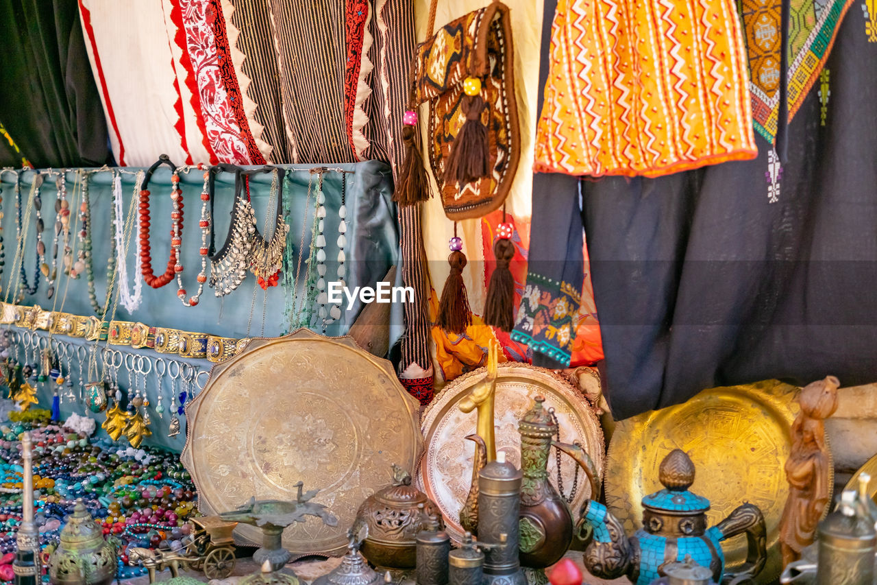 Various objects in market stall for sale