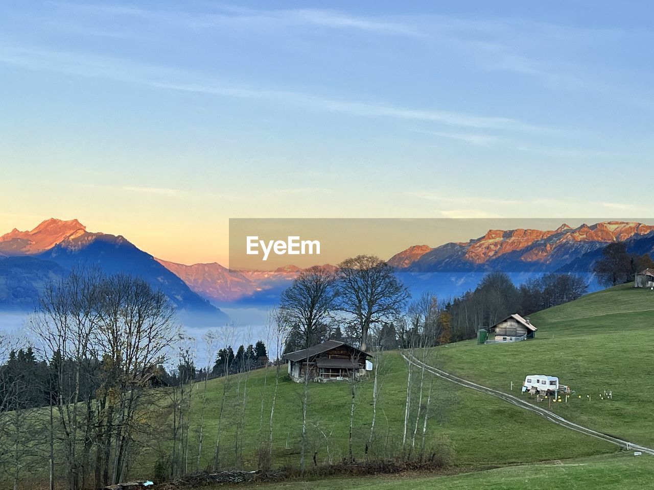 PANORAMIC VIEW OF LANDSCAPE AGAINST SKY DURING SUNSET