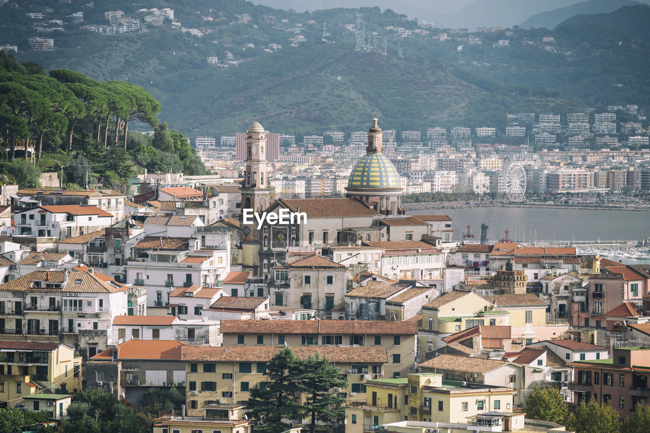 Panoramic view of vietri sul mare and in the background salerno to mean a concept