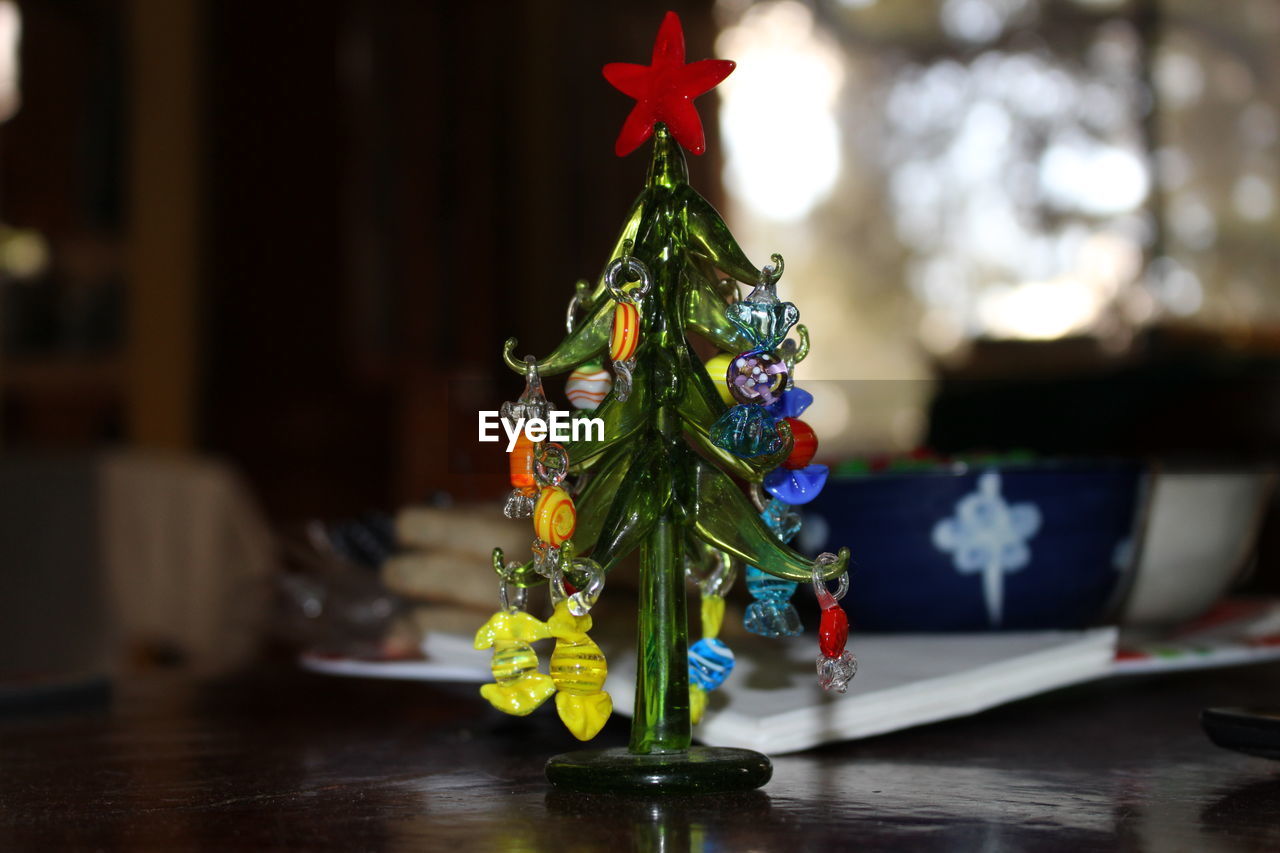 Close-up of christmas tree on table