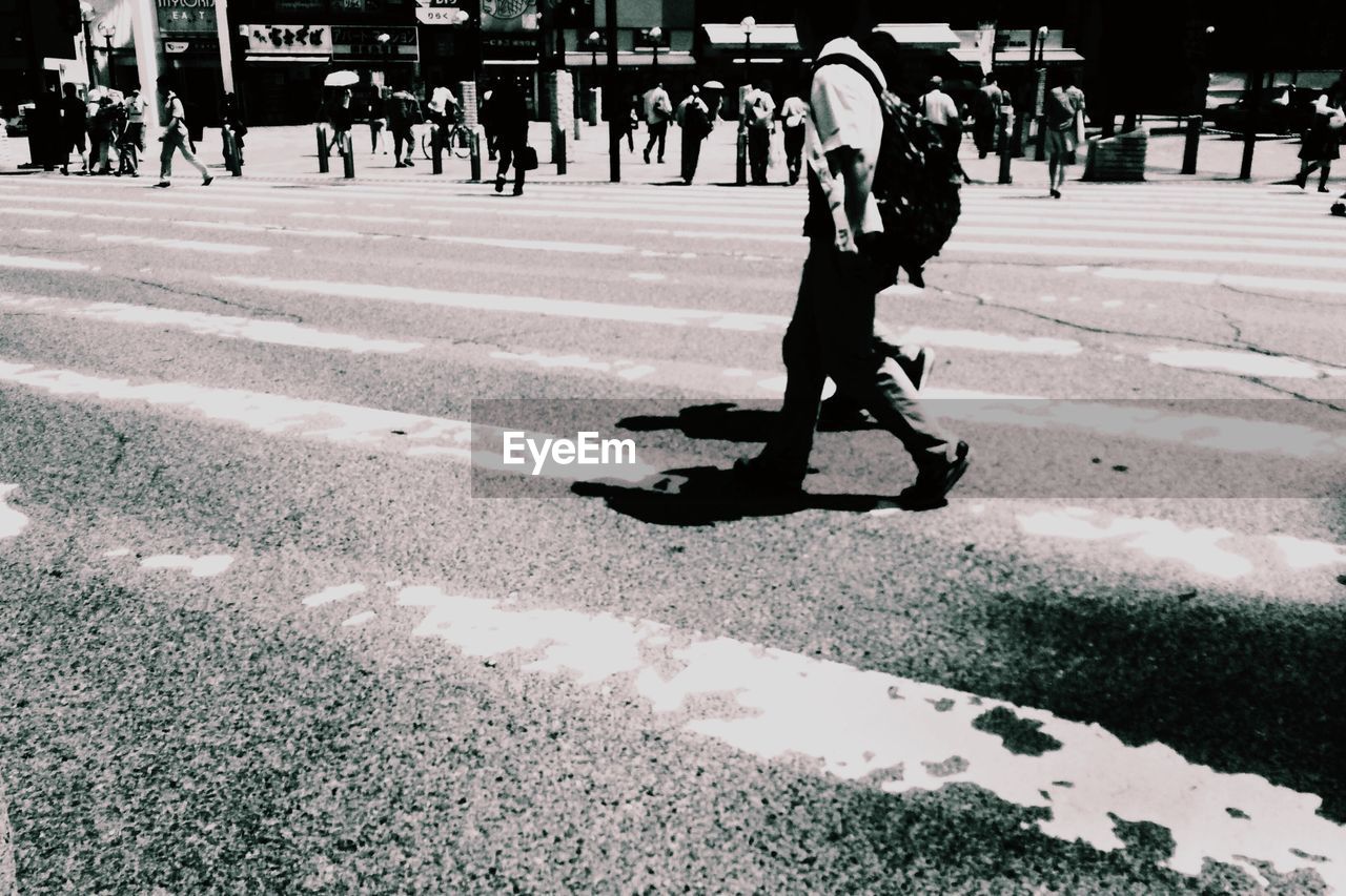 PEOPLE WALKING ON STREET