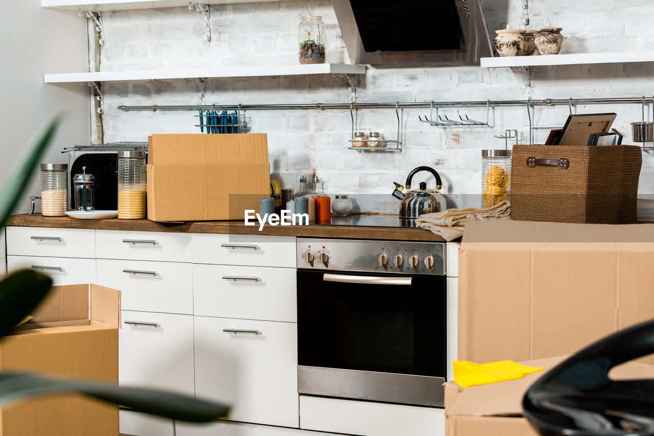 low section of man working on shelf