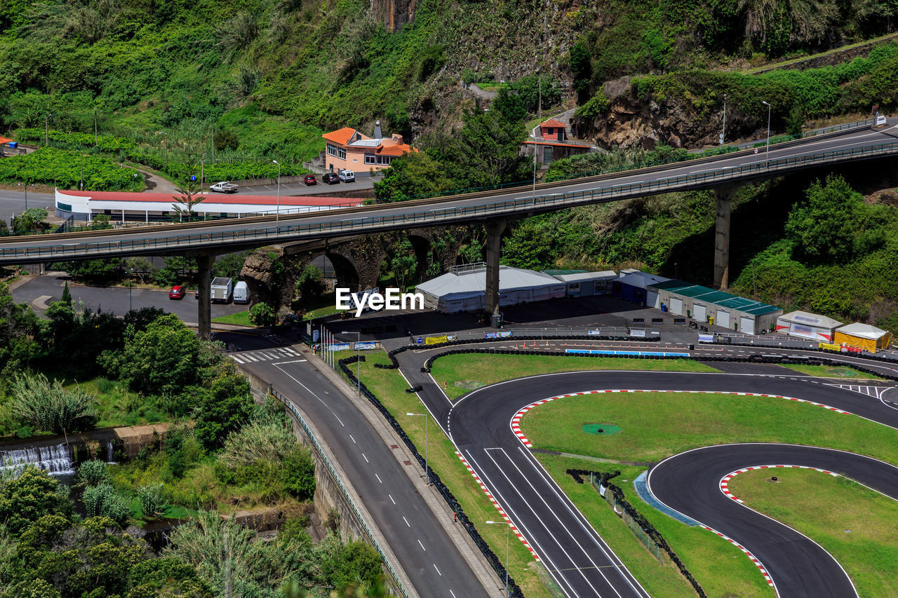  high angle view of karting track and bridge