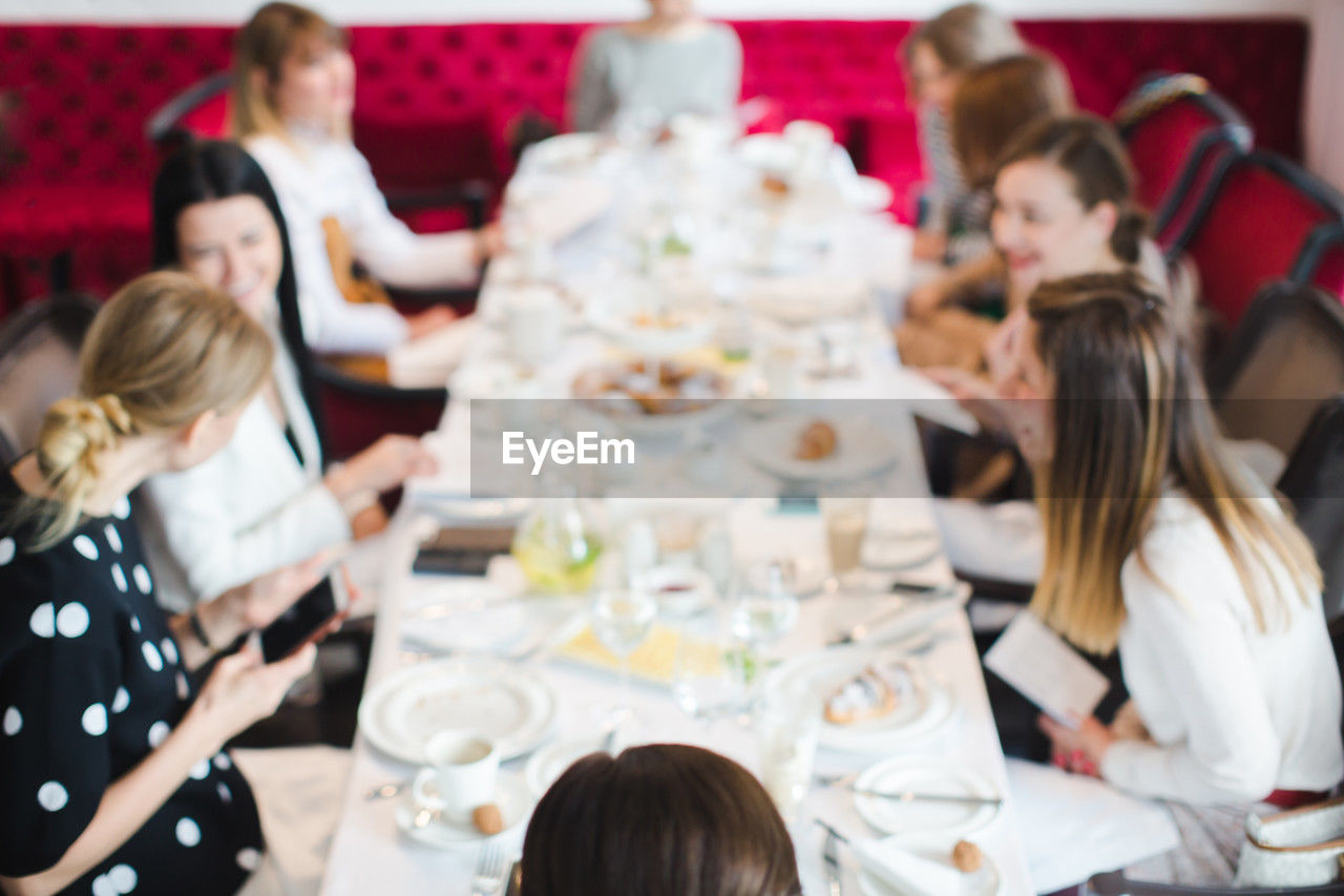 Women having meeting bluer soft focus