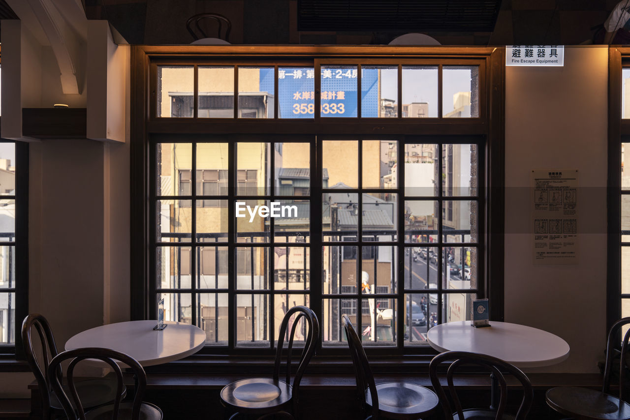 Empty chairs and table in restaurant