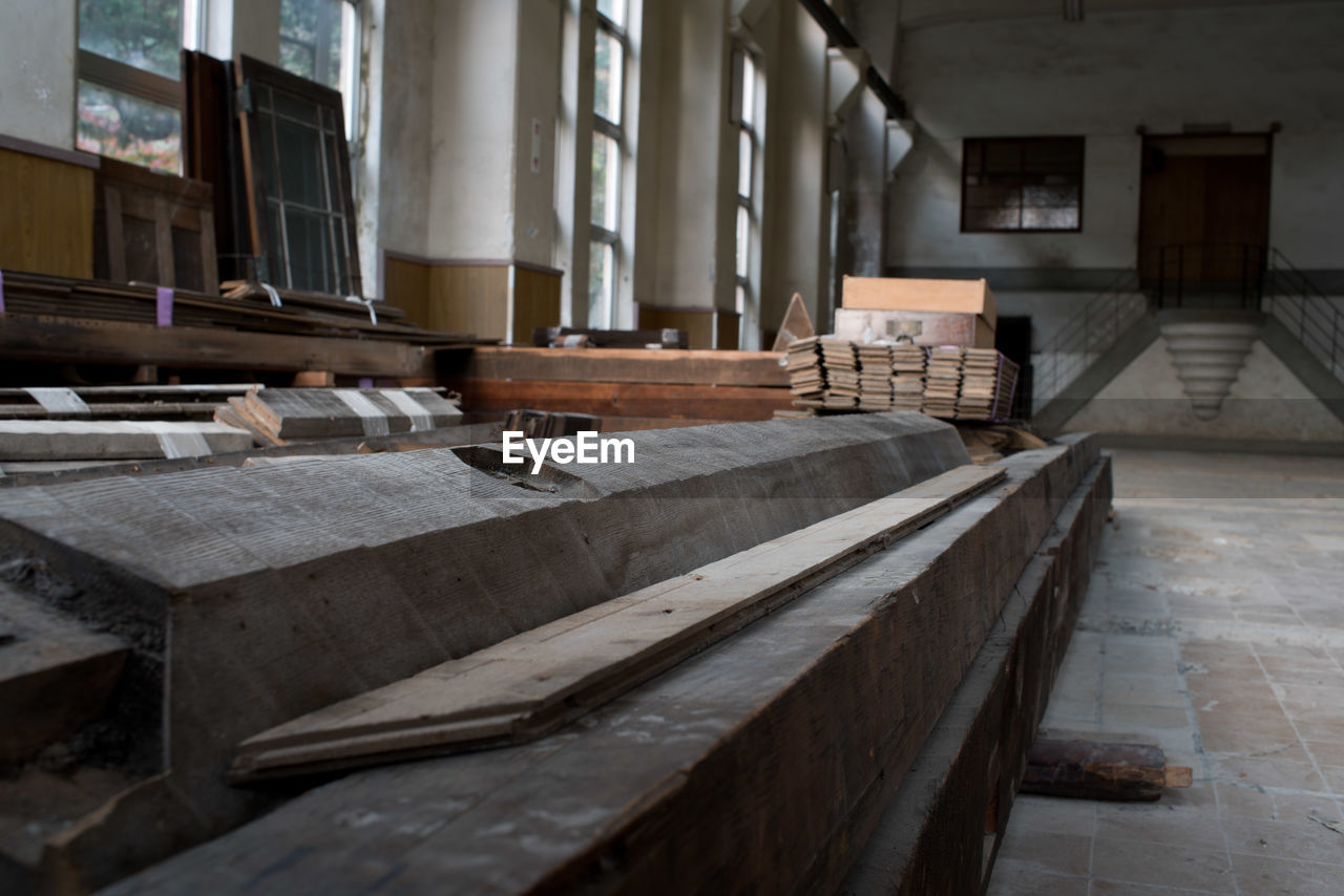 EMPTY BENCHES AND TABLE IN ROW