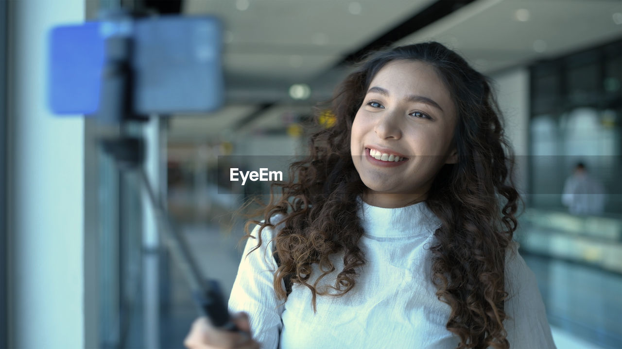 Portrait of a smiling young woman