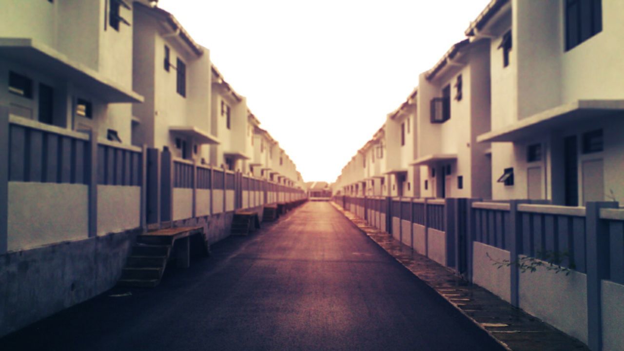 NARROW WALKWAY IN CITY