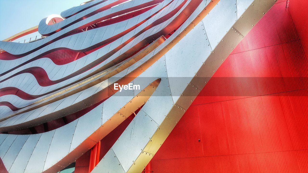 LOW ANGLE VIEW OF FLAGS AGAINST SKY