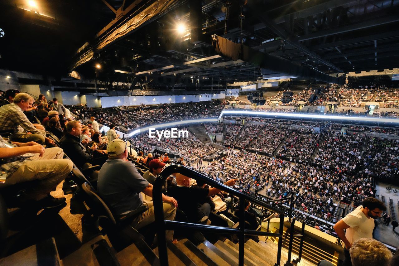 CROWD AT ILLUMINATED STADIUM