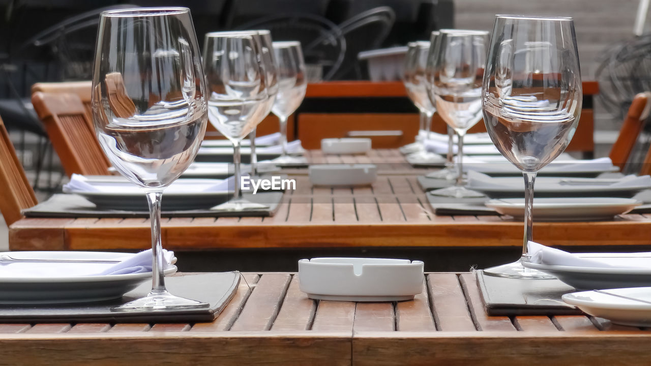 Drinking glasses on table in restaurant