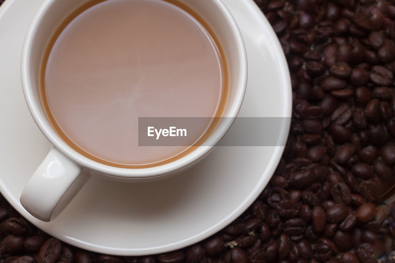 Close-up of coffee on roasted beans