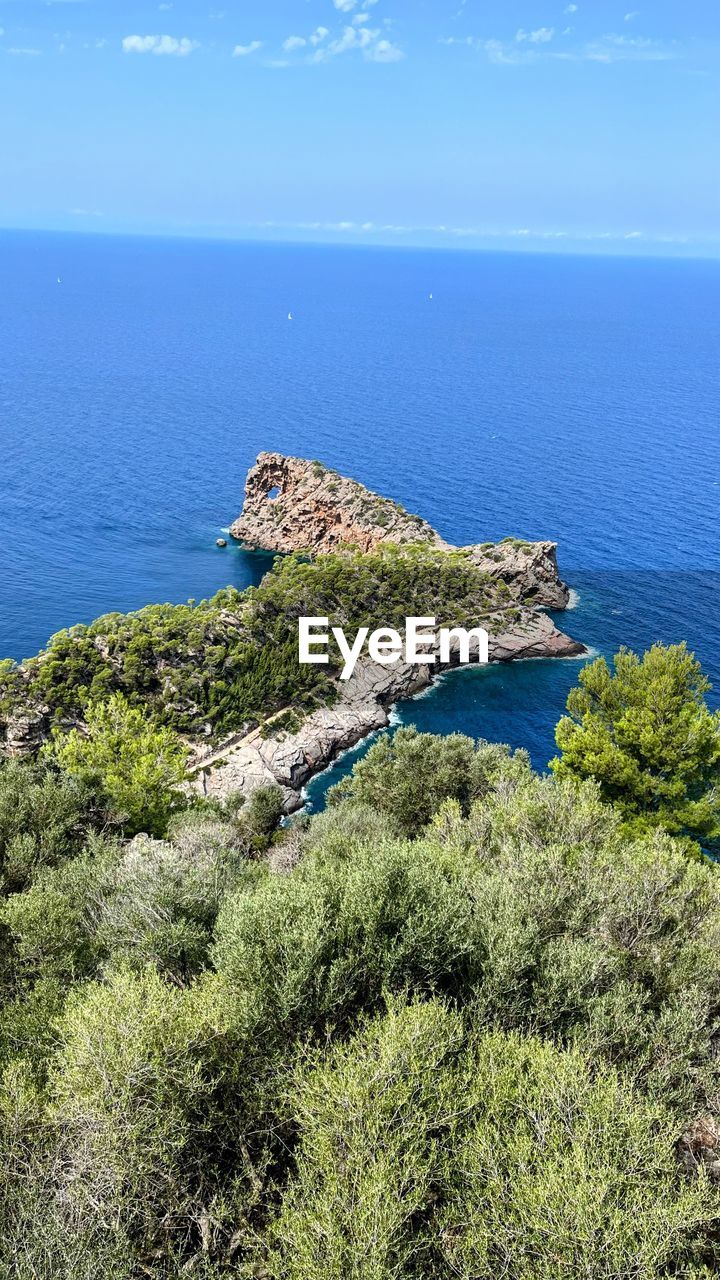 sea, water, scenics - nature, beauty in nature, coast, land, sky, nature, plant, horizon over water, tranquility, ocean, tranquil scene, beach, horizon, cliff, shore, no people, blue, islet, day, high angle view, terrain, idyllic, bay, travel destinations, non-urban scene, outdoors, tree, travel, environment, coastline, promontory, landscape, tourism, mountain, rock, green, island, vacation, growth, archipelago, body of water, cloud, cove