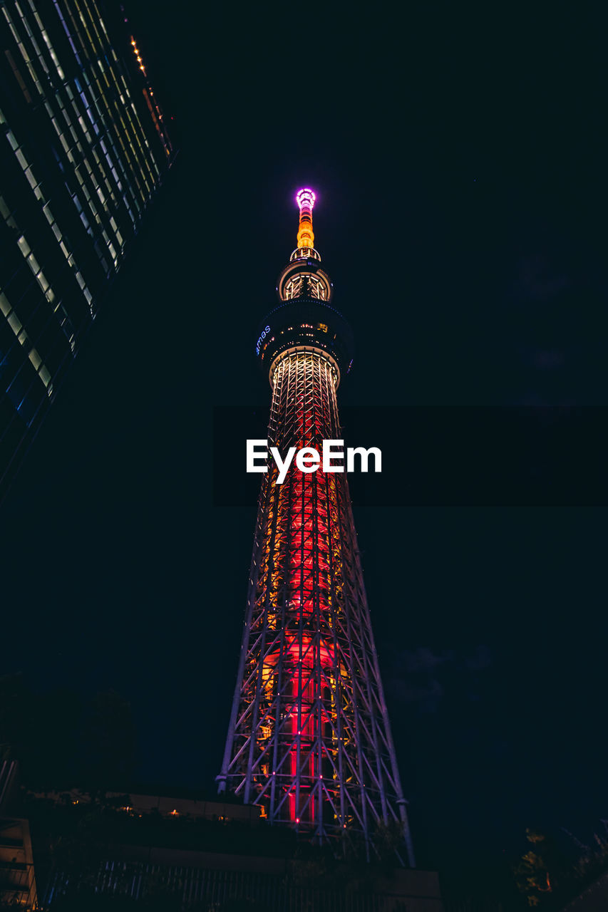 Low angle view of tokyo skytree against sky at night