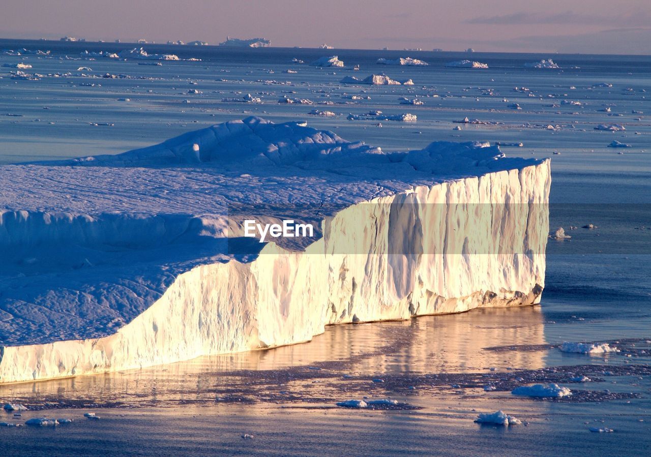 Scenic view of glacier and lake