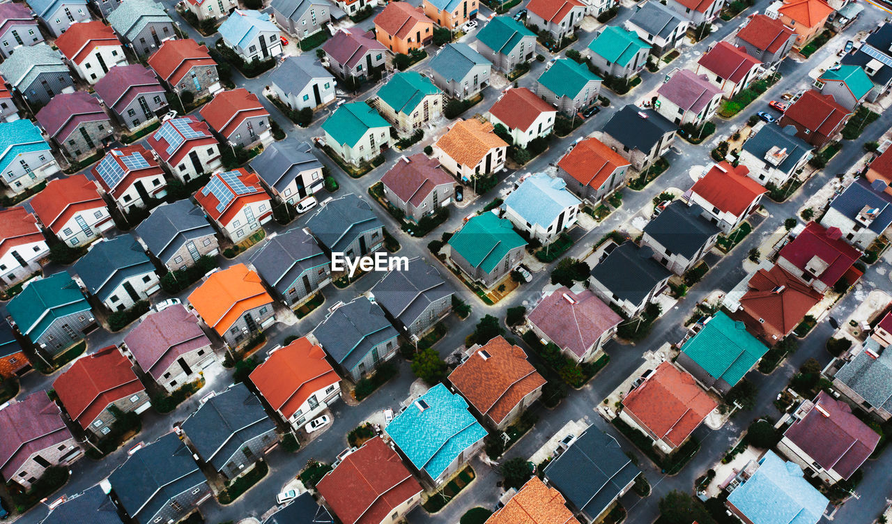 High angle view of multi colored houses in city