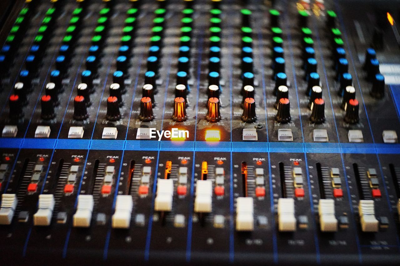 Full frame shot of sound mixer in recording studio