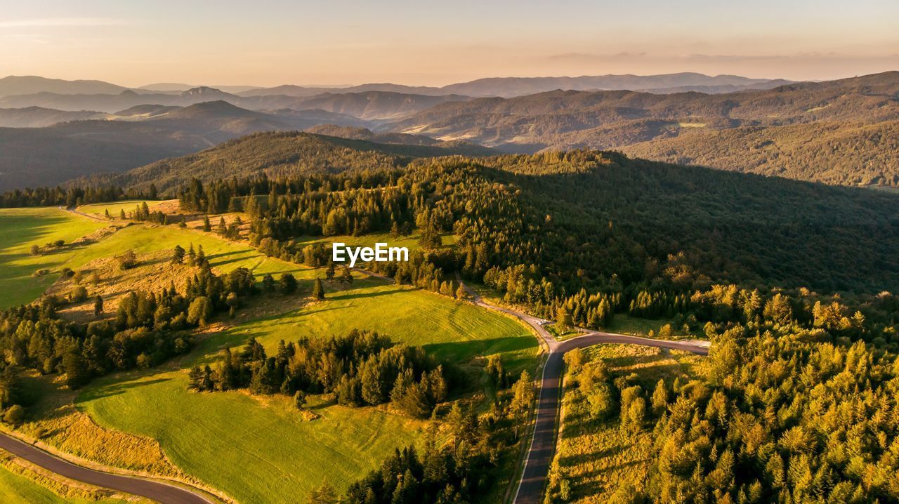 Scenic view of landscape against sky during sunset