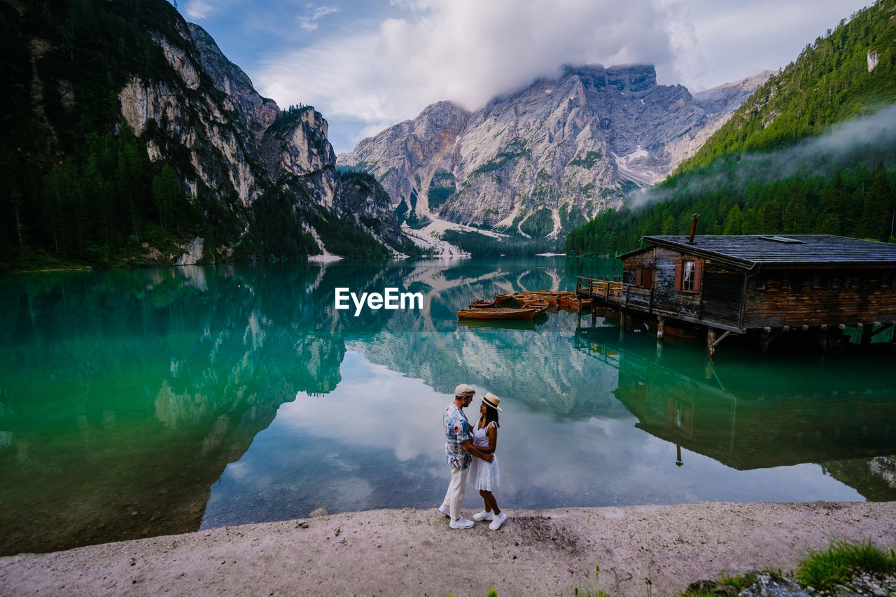 PANORAMIC VIEW OF LAKE AGAINST MOUNTAINS