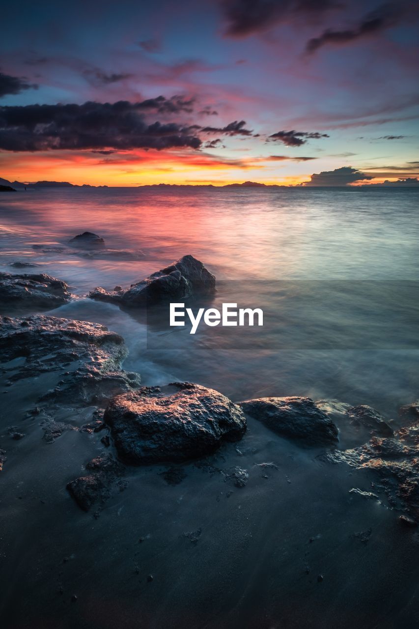Scenic view of sea against sky during sunset