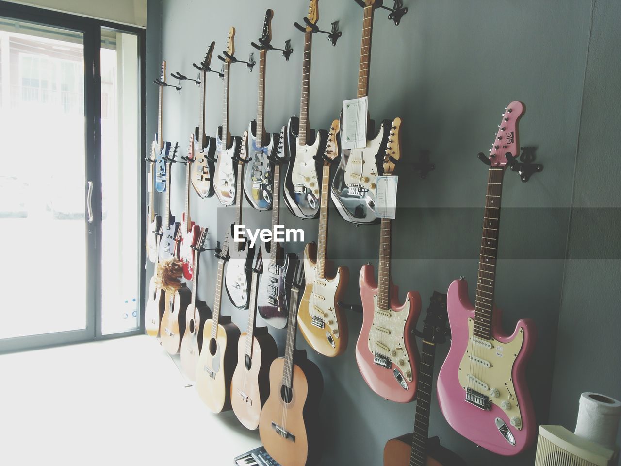 CLOTHES HANGING ON THE WALL IN KITCHEN