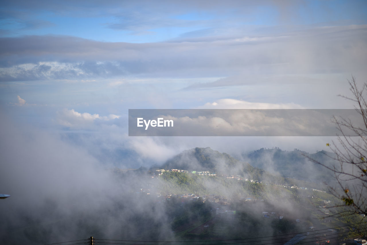 cloud, sky, morning, environment, fog, nature, mountain, mist, beauty in nature, scenics - nature, tree, landscape, no people, plant, land, smoke, sunlight, day, outdoors, snow, tranquility, dawn, tranquil scene, travel, non-urban scene, mountain range, travel destinations