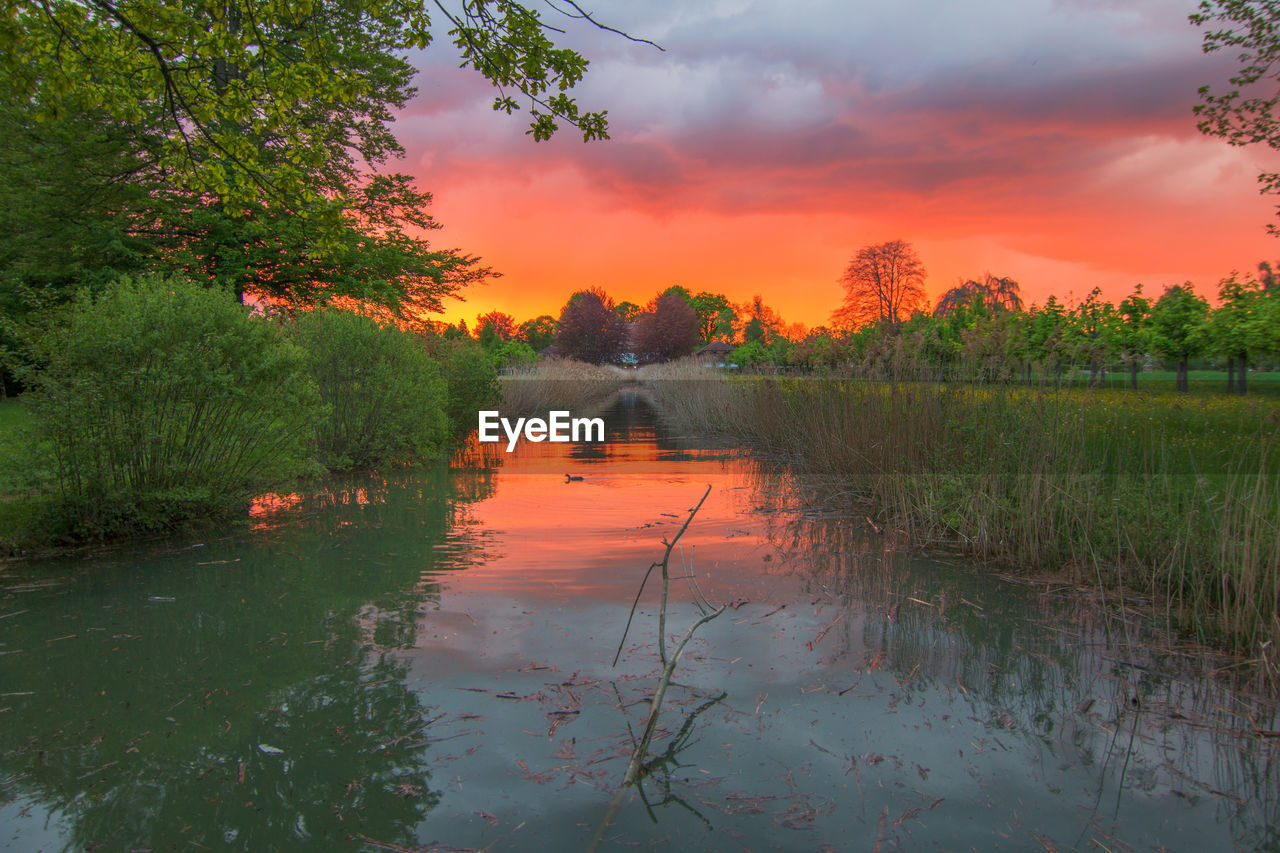 SUNSET OVER LAKE