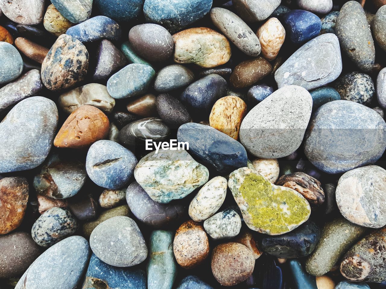 HIGH ANGLE VIEW OF STONES