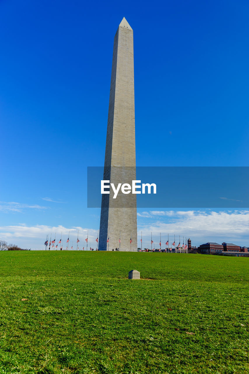 Washington monument against blue sky